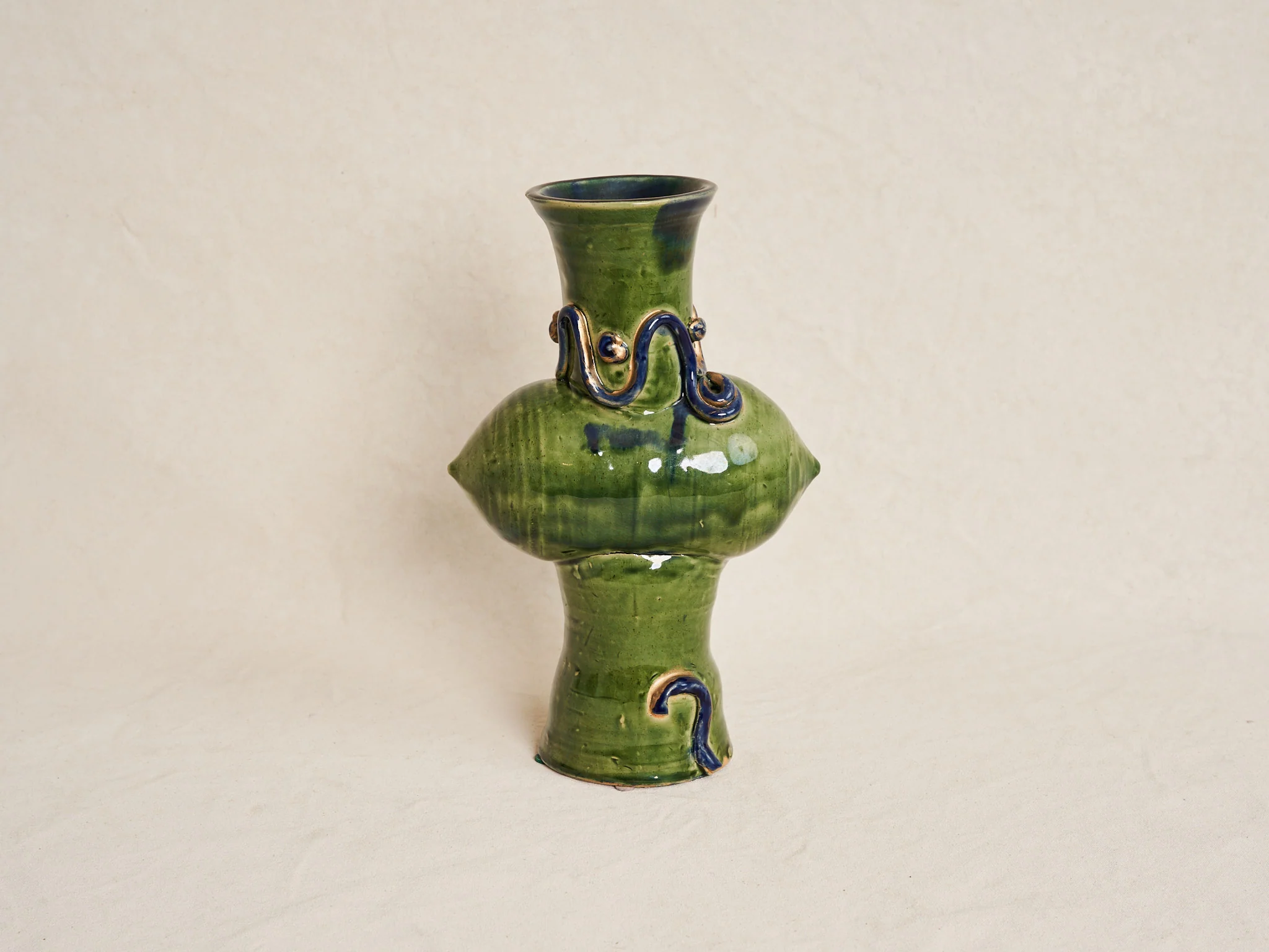 PAT SCHOENFELD GREEN VASE WITH VINE D4" x W8" x H12"